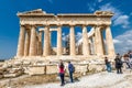 People visit the Ancient Greek Parthenon on the Acropolis of Athens, Greece